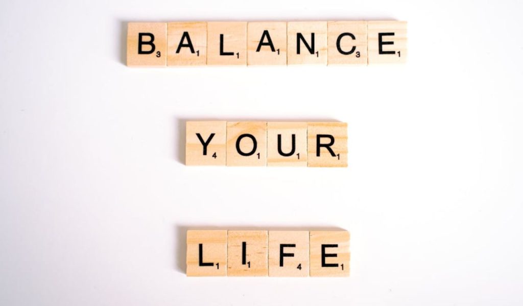 Text tiles spelling “BALANCE YOUR LIFE” — a simple visual for creating a more balanced lifestyle.