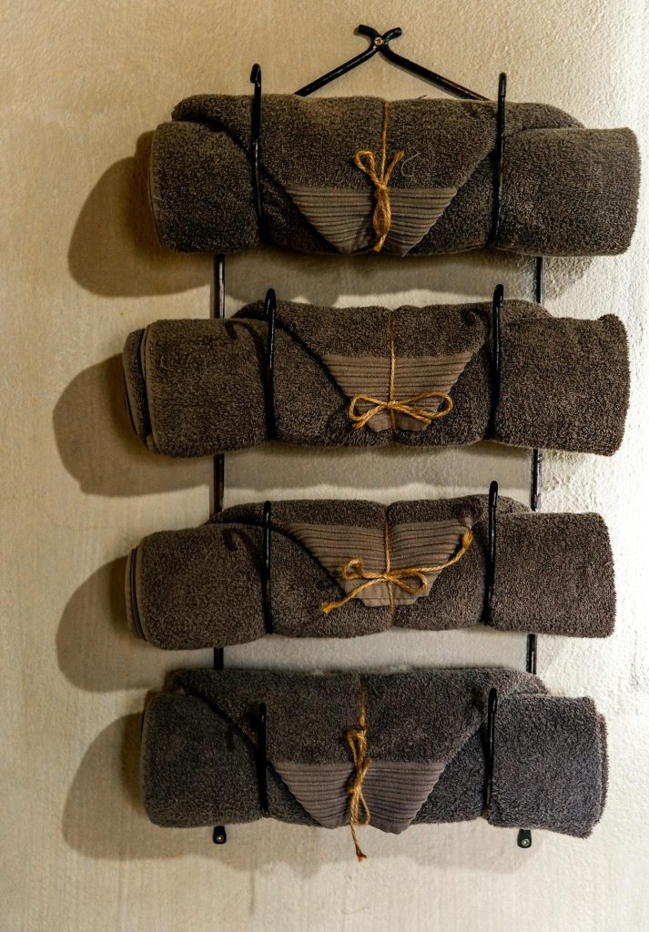   Install wall hooks instead of bulky racks