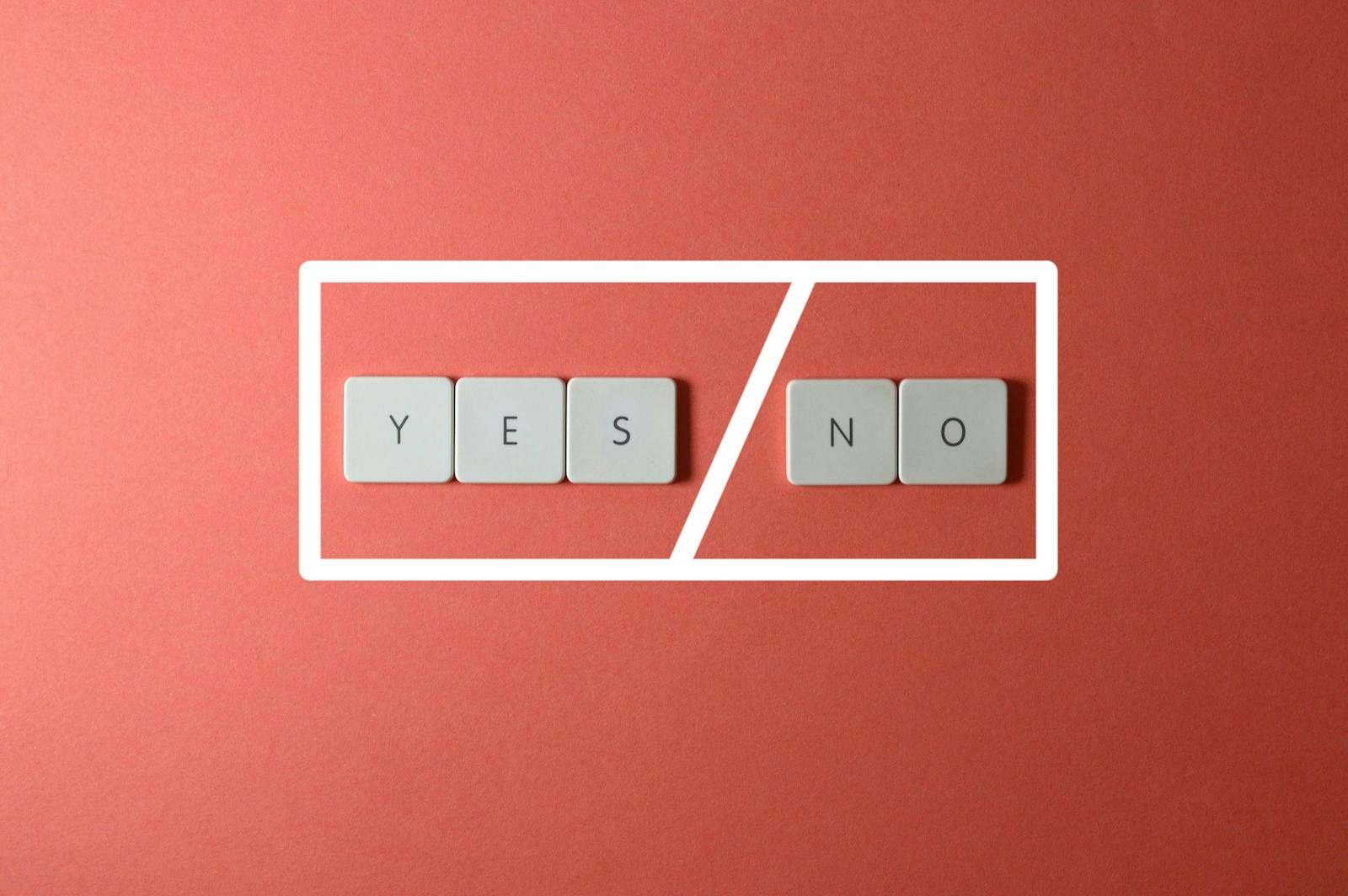 Creative concept of decision making with YES and NO keys on a red background.