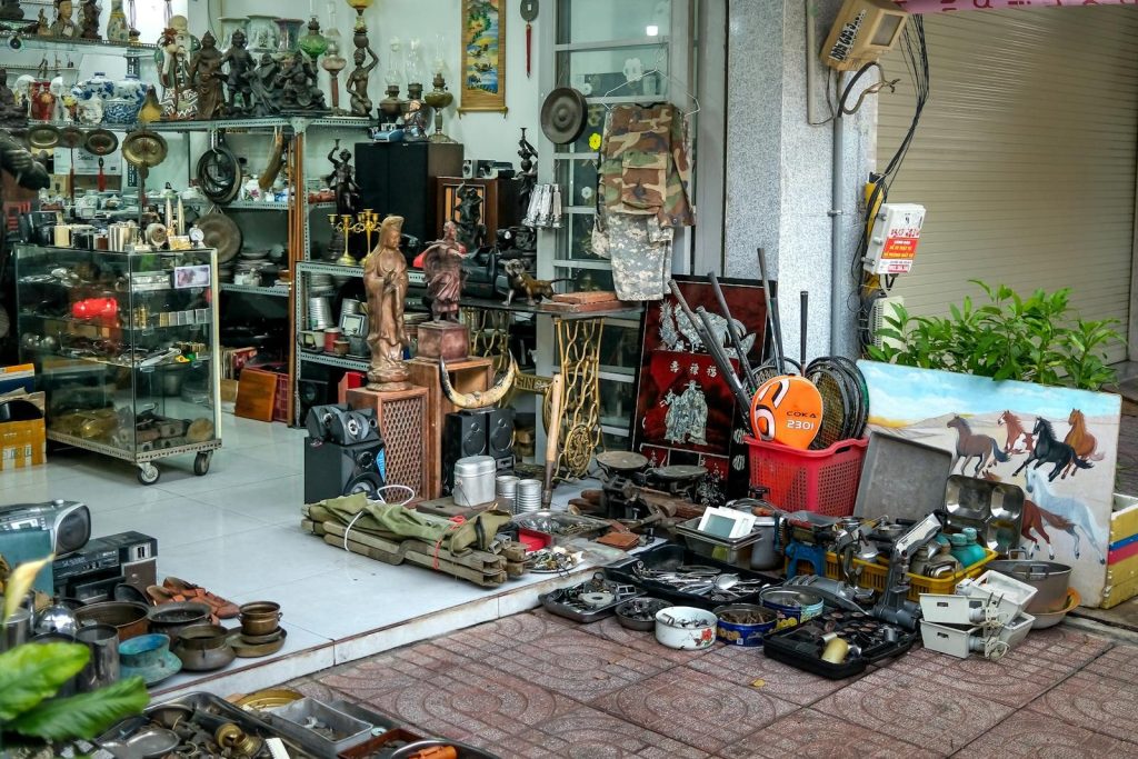 Explore a diverse range of antiques and collectibles displayed in a bustling retail store.