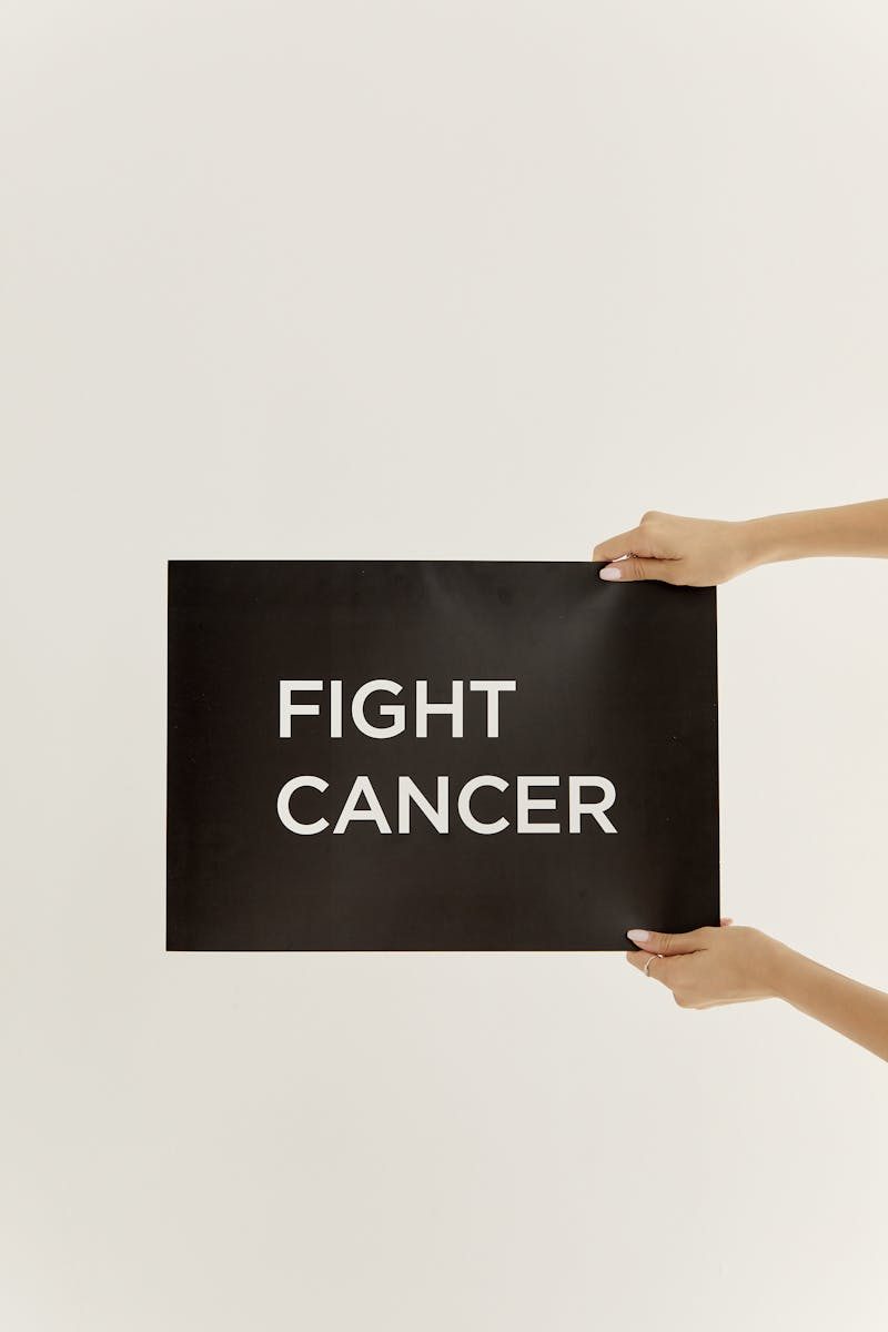 Minimalist poster with 'Fight Cancer' text, perfect for awareness campaigns.